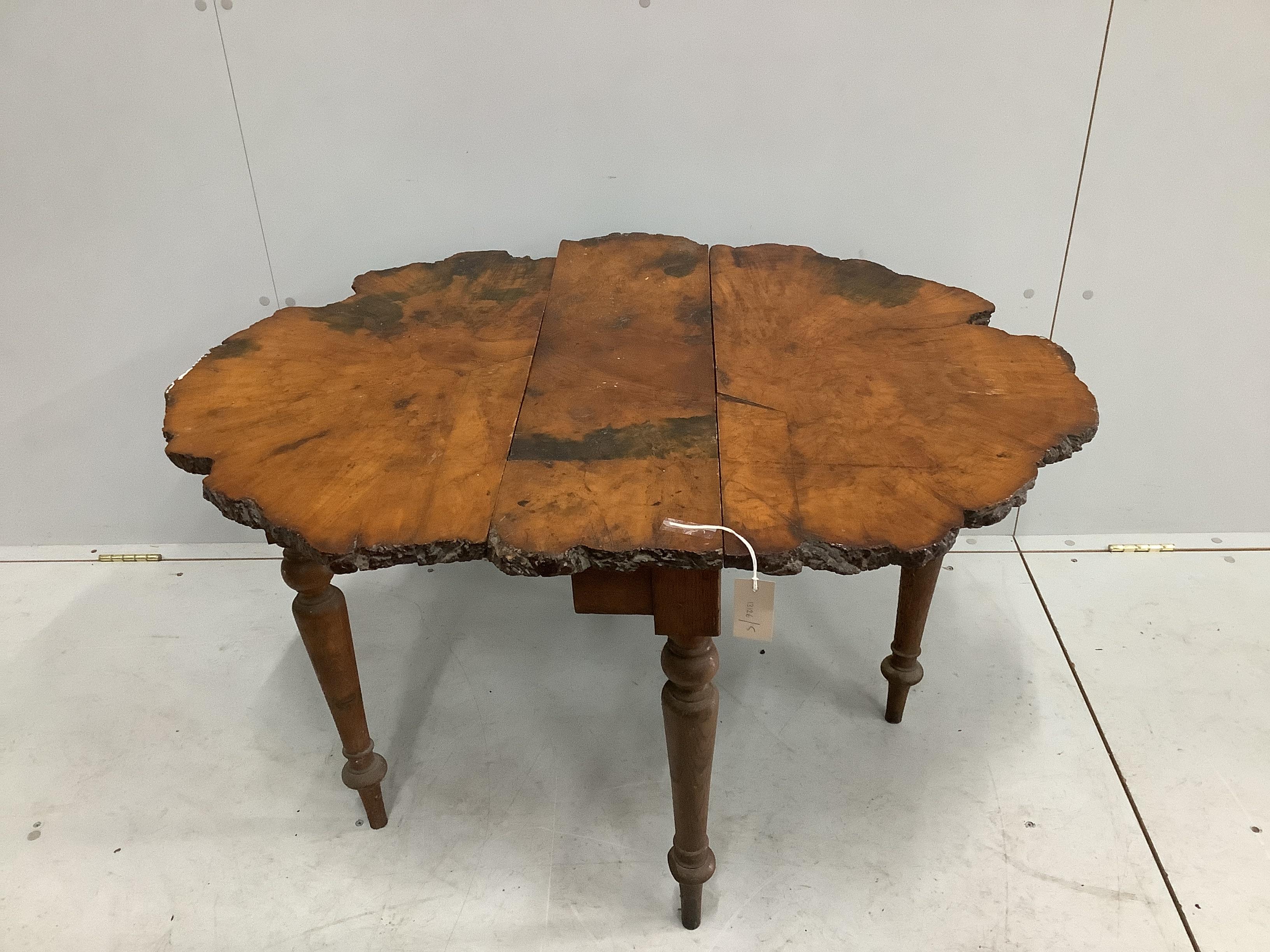 A Provincial waney edge Sutherland table, width 77cm, depth 26cm, height 61cm